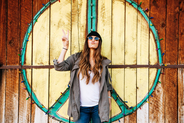 hippie woman peace sign wood sunglasses
